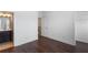 Spacious bedroom with hardwood floors and access to a full bathroom at 4223 Deming Cir, Atlanta, GA 30342