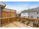 Private deck with wooden railings and lattice, overlooking neighboring townhouses at 4223 Deming Cir, Atlanta, GA 30342