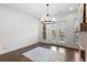 Spacious dining area with hardwood floors and a stylish chandelier at 4223 Deming Cir, Atlanta, GA 30342