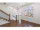 Living area with hardwood floors and a view to the staircase at 4223 Deming Cir, Atlanta, GA 30342