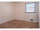 Bright bedroom featuring a window and neutral walls at 785 Jett Rd, Jonesboro, GA 30236