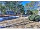 View of the shed, well, and spacious backyard area at 340 Annslee Cir, Loganville, GA 30052