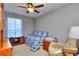 Bedroom with a single bed, neutral walls and ceiling fan at 340 Annslee Cir, Loganville, GA 30052