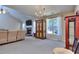 Inviting living room with a stone fireplace, wooden accents, and natural light at 340 Annslee Cir, Loganville, GA 30052