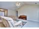 Bright living room featuring neutral walls, plush seating, and an upright piano at 340 Annslee Cir, Loganville, GA 30052