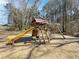 will love this awesome playground with slide and swings, all in a backyard setting at 340 Annslee Cir, Loganville, GA 30052