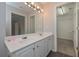 Bathroom with double vanity and access to a walk-in closet at 5146 Manerdale Se Dr # 4, Atlanta, GA 30339