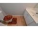 Small bathroom with white vanity and wood flooring at 5146 Manerdale Se Dr # 4, Atlanta, GA 30339