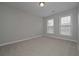 Bright bedroom featuring neutral walls and carpet at 5146 Manerdale Se Dr # 4, Atlanta, GA 30339