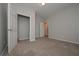 Spacious bedroom with neutral carpeting and closet at 5146 Manerdale Se Dr # 4, Atlanta, GA 30339