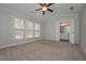 Main bedroom with vaulted ceiling, large windows, and en-suite bath at 5146 Manerdale Se Dr # 4, Atlanta, GA 30339