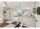 Kitchen features a breakfast bar and stainless steel appliances at 5220 Otter Creek Run, Cumming, GA 30040