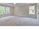 Spacious bedroom with carpet flooring and large windows at 746 Trevett Way, Marietta, GA 30062