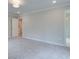 Bright and airy bedroom with carpet flooring and access to bathroom at 746 Trevett Way, Marietta, GA 30062