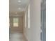 Light-filled entryway with hardwood floors and neutral walls at 746 Trevett Way, Marietta, GA 30062