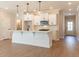 Well-equipped kitchen featuring sleek countertops, a convenient island, and modern lighting at 746 Trevett Way, Marietta, GA 30062