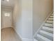 Modern staircase with light gray treads and white risers at 746 Trevett Way, Marietta, GA 30062