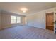 Bright bedroom with large window and soft carpeting at 754 Trevett Way, Marietta, GA 30062