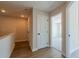 Upstairs hallway with hard wood floors and access to bedroom at 754 Trevett Way, Marietta, GA 30062