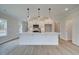 Modern kitchen with white cabinetry, quartz countertops, and island at 754 Trevett Way, Marietta, GA 30062