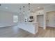 Open concept kitchen with white cabinets and a large island at 754 Trevett Way, Marietta, GA 30062