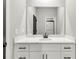 Clean bathroom with a white vanity and a large mirror at 8950 Callaway Dr, Winston, GA 30187