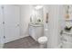 Clean bathroom with granite countertop and a bathtub at 11555 Chatham Dr, Hampton, GA 30228