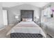 Serene bedroom featuring a luxurious bed and calming decor at 11555 Chatham Dr, Hampton, GA 30228