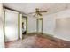 Hardwood floor bedroom with doors to other rooms at 28 Gertrude Pl, Atlanta, GA 30318