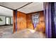 Wood paneled dining room with patterned flooring at 28 Gertrude Pl, Atlanta, GA 30318