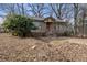 Tan colored house needing some repairs with a yard at 28 Gertrude Pl, Atlanta, GA 30318