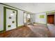 Large living room with hardwood floors and green trim at 28 Gertrude Pl, Atlanta, GA 30318