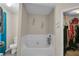 Bathroom with garden tub, toilet and walk-in closet at 593 Shadow Valley Ct, Lithonia, GA 30058