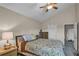 Bright bedroom with a double bed and ceiling fan at 593 Shadow Valley Ct, Lithonia, GA 30058