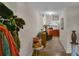 Bright entryway with hardwood floors, coat rack, and view of the living room at 593 Shadow Valley Ct, Lithonia, GA 30058