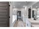 Double vanity bathroom with a view of the main bedroom at 8920 Callaway Dr, Winston, GA 30187