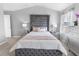 Main bedroom with a large bed and plenty of natural light at 11571 Chatham Dr, Hampton, GA 30228