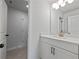 Modern bathroom with white vanity and a quartz countertop at 4074 Hosch Retreat Dr, Buford, GA 30519