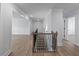 Upper hallway with a stylish railing overlooking the lower level at 4074 Hosch Retreat Dr, Buford, GA 30519
