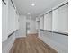 Generous walk-in closet with custom shelving and hanging rods at 4074 Hosch Retreat Dr, Buford, GA 30519