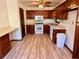 Galley style kitchen with wood cabinets and appliances at 5072 Hubert Dr, Powder Springs, GA 30127