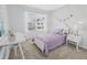 Cozy bedroom with white bed frame and unicorn theme at 11583 Chatham Dr, Hampton, GA 30228