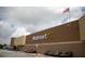 Exterior view of a Walmart store with plants in front at 11591 Chatham Dr, Hampton, GA 30228