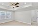 Bright bedroom with carpet, ceiling fan, and window at 134 Briargate Dr # 16, Johns Creek, GA 30097