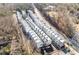 Aerial view of townhouses community near a road and trees at 1779 Beckham Ne Pl # 58, Atlanta, GA 30324