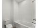 Clean bathroom with white tile and bathtub at 1779 Beckham Ne Pl # 58, Atlanta, GA 30324