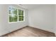 Spacious bedroom with hardwood floors and large window at 1779 Beckham Ne Pl # 58, Atlanta, GA 30324