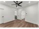 Spacious bedroom with hardwood floors and access to two bathrooms at 1779 Beckham Ne Pl # 58, Atlanta, GA 30324