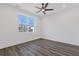 Bright bedroom with wood-look floors and large window at 1779 Beckham Ne Pl # 58, Atlanta, GA 30324