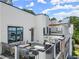 Modern rooftop deck with built-in grill and seating at 1779 Beckham Ne Pl # 58, Atlanta, GA 30324